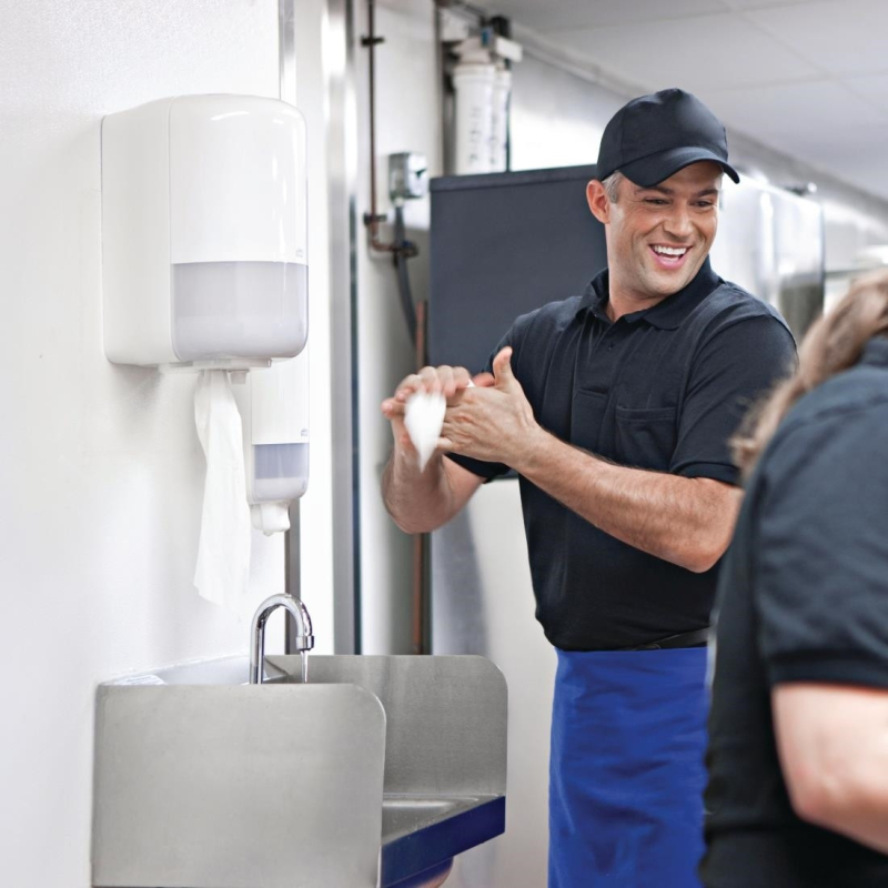 Witte dispenser voor Tork centreerhaspels